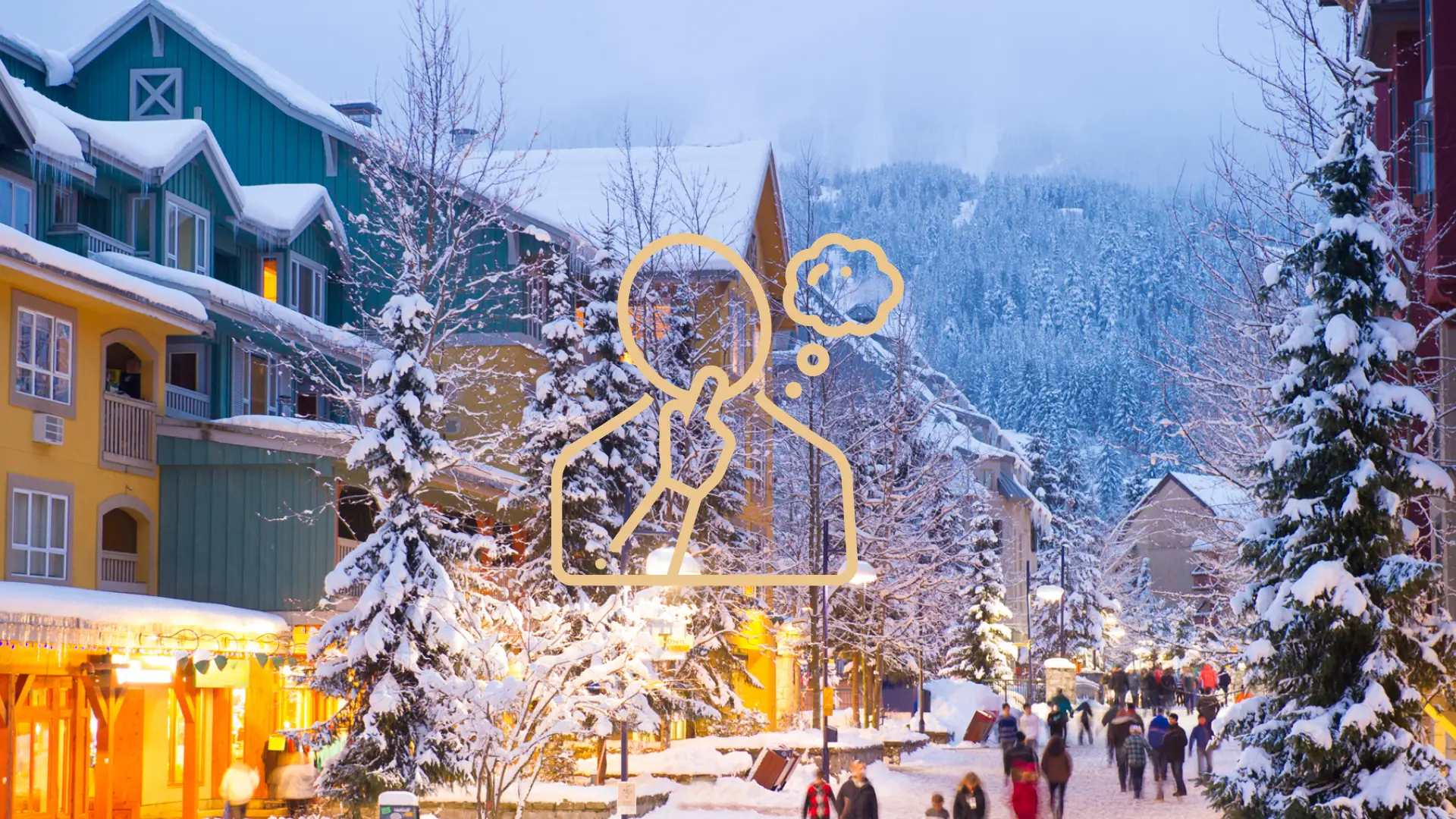 Snow capped Whistler Village condos for sale during a winter day