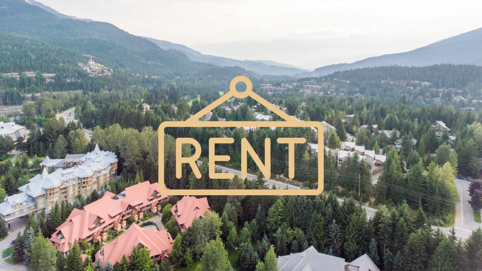 An aerial view of a Whistler property surrounded by trees and the mountains. A graphic saying "rent" is overlaid.